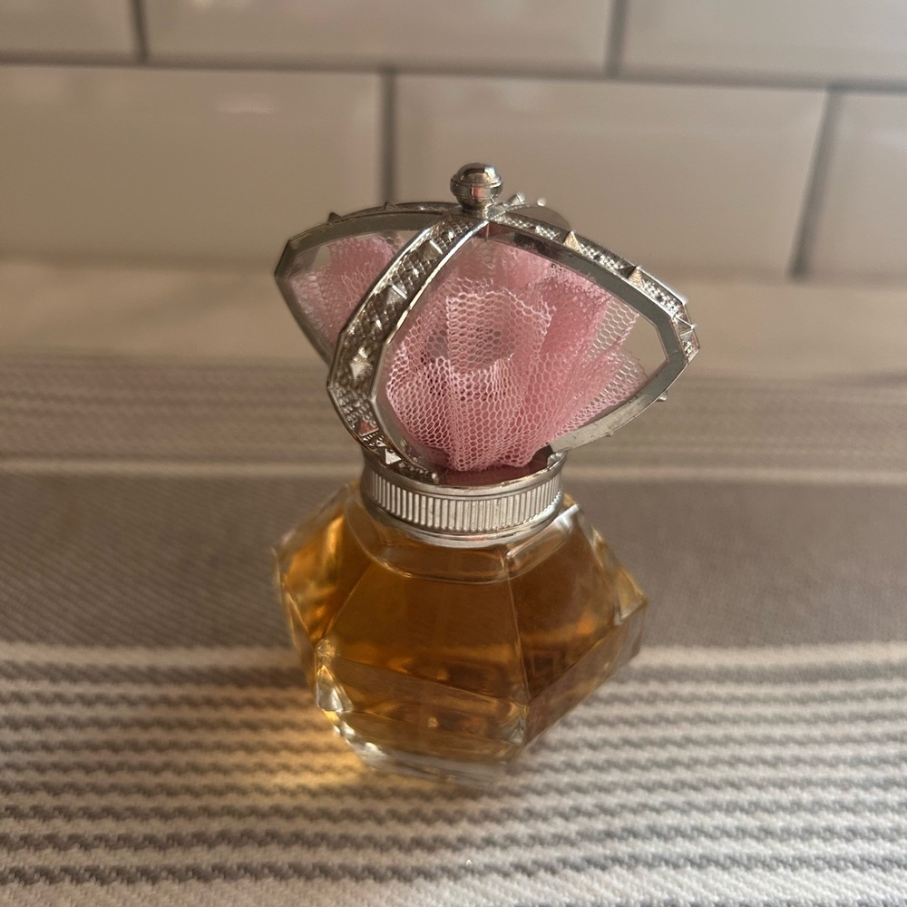 One Direction “Our Moment” Perfume.  No box. Full bottle  30 Mil. 1 oz